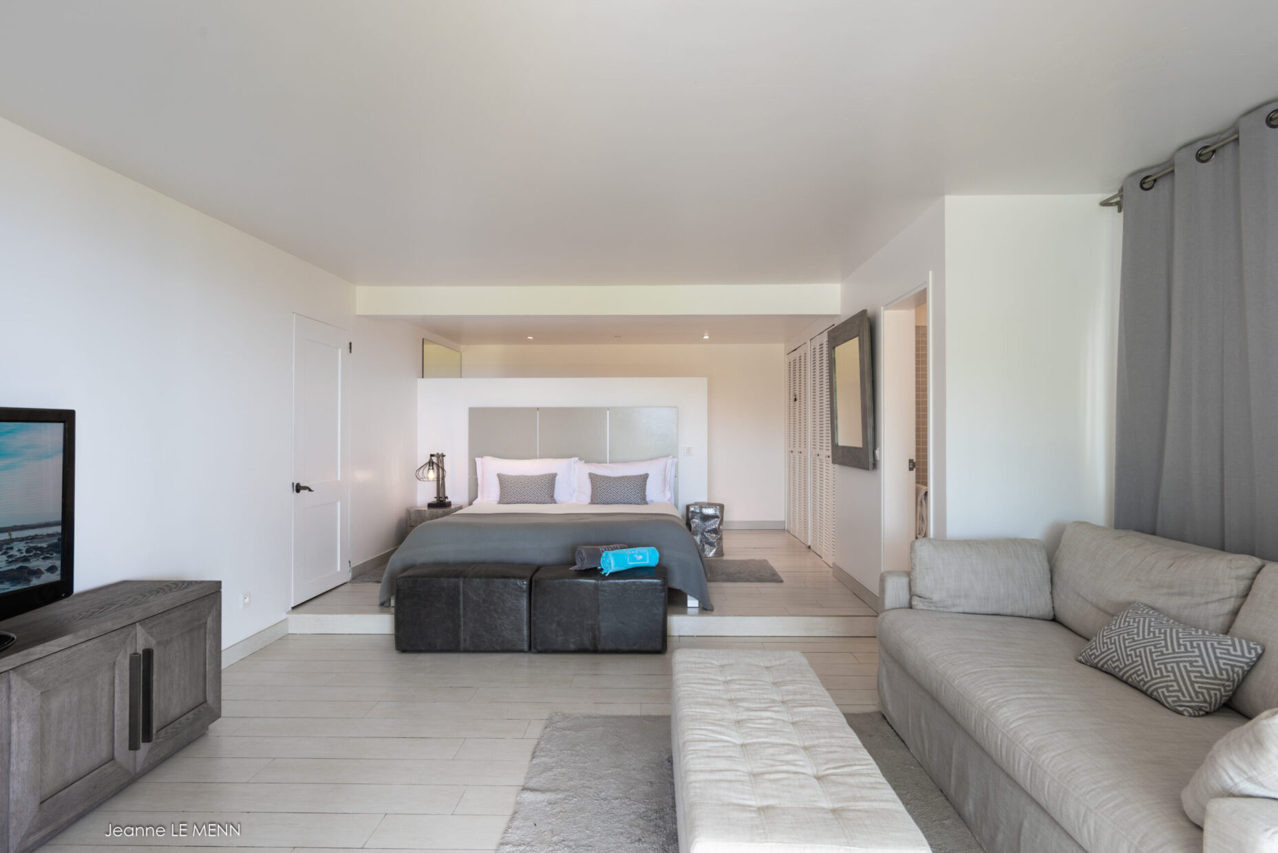Modern grey-toned bedroom suite at Villa Avalon, St. Barts.