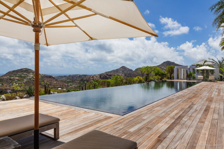 Villa Olive sun deck and infinity-edge pool at midday