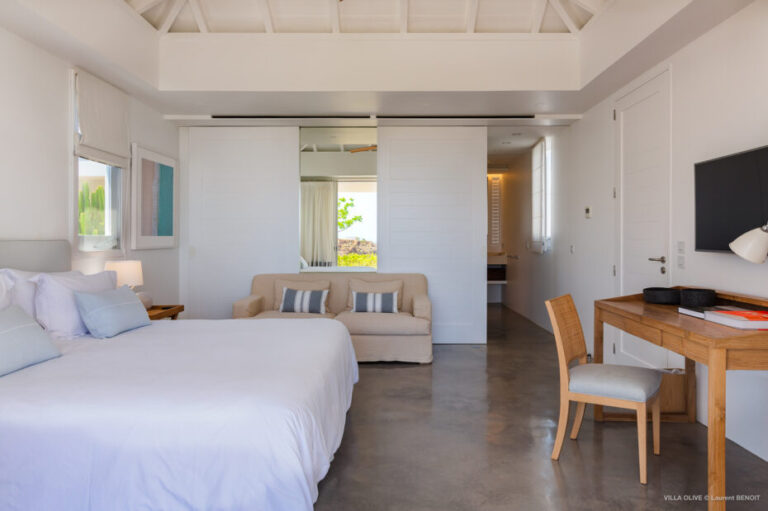 Villa Olive guest room with clean lines and high ceiling