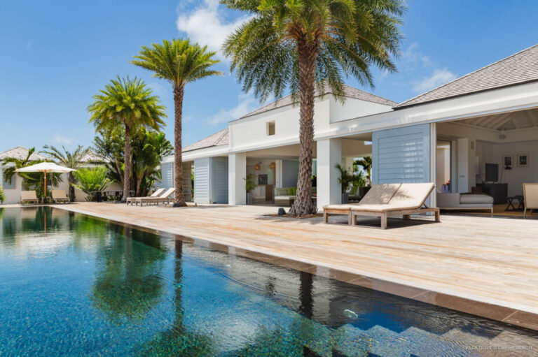 Luxury pool deck with loungers at Villa Olive St. Barts