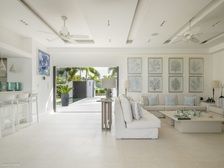 Spacious open-plan living area with garden access at Villa Antares, St. Barts.
