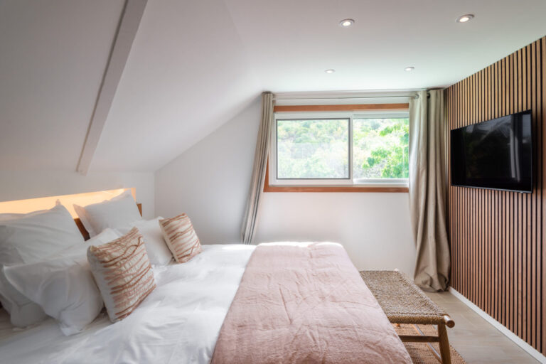 Cozy attic bedroom with TV at Villa Aqua, St. Barts.