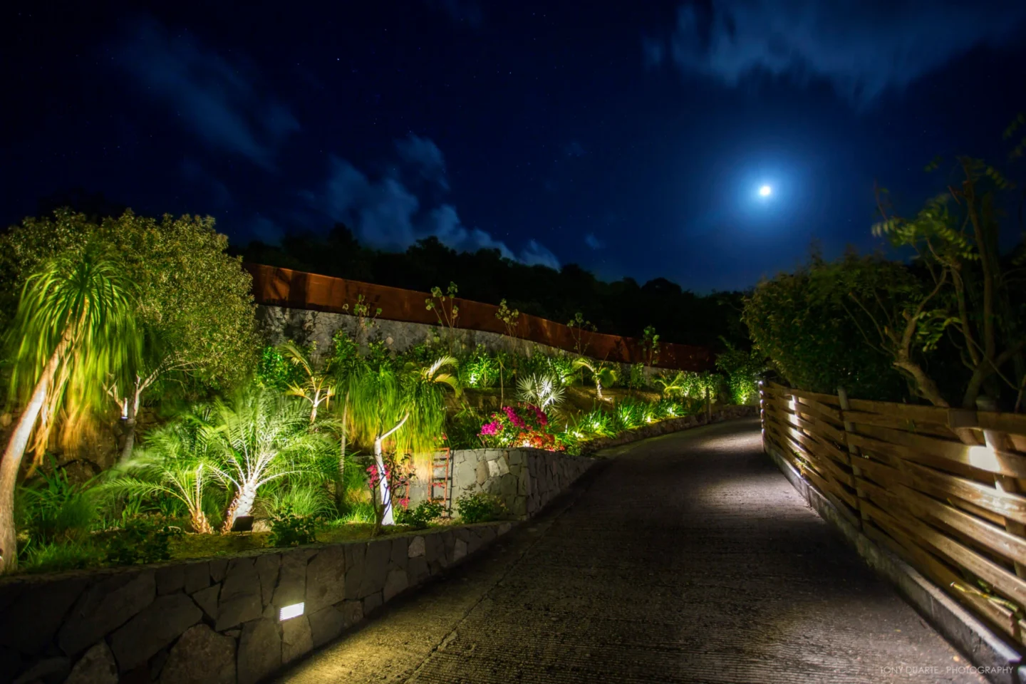 Villa Xanadu illuminated garden path and moonlit driveway.